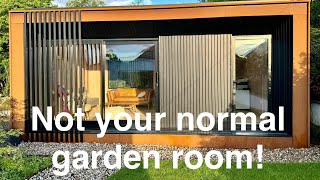 A contemporary garden studio using Corten steel black timber cladding and a plywood lined interior [upl. by Piegari]