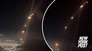 Alarming cockpit footage shows Iranian rockets falling near flight over Middle East [upl. by Arahsat631]