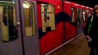 DLR train leaving Cutty Sark Station [upl. by Tahmosh]