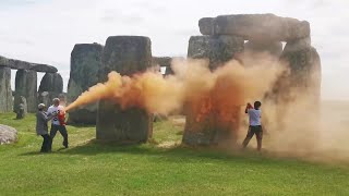 Shocking scene shows activists vandalizing Stonehenge as Good Samaritan tries to intervene [upl. by Assirrac]