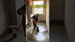 The process of leveling foam concrete in the bathroom with a shovel [upl. by Pammi473]