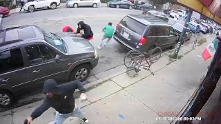 Chicago shootout that injured innocent bystander caught on video [upl. by Mcgannon]