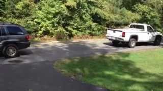 Jeep Grand Cherokee WJ 47 VS GMC Sierra 60 Tug of War [upl. by Milon]