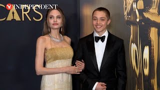 Angelina Jolie and Brad Pitts son Knox accompanies her at Governors Awards 2024 [upl. by Ayatal]