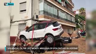 Valencia oltre 211 morti Migliaia di volontari in azione [upl. by Hsizan311]