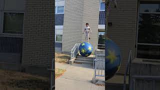 Street Performer Falls off Large Circus Ball While Attempting to Climb down Steps  1529657 [upl. by Netnilc]