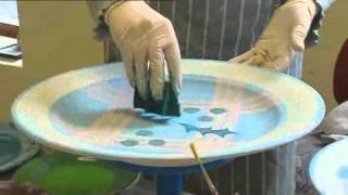 Tain Pottery  Decorating the pottery  hand painting a plate [upl. by Ettennod]