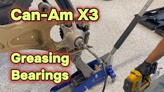 How To Grease Wheel Bearings on a CanAm X3 [upl. by Eirroc257]