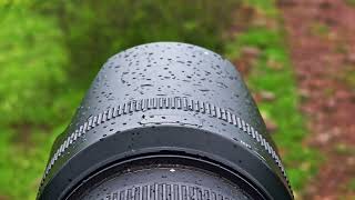 drops of rain falling on black lens hood [upl. by Tiphani]