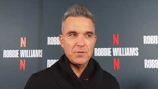 Robbie Williams says fame is mental illness as he premieres Netflix docuseries in London [upl. by Atsirc]