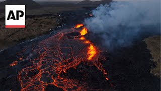 Lava flows near Iceland town after fourth volcano eruption in three months [upl. by Towill]