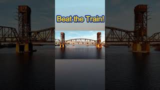 Beat the Train drone dronevideo train trainbridge bridge philadelphia philly djiair3s [upl. by Nylhtiak505]