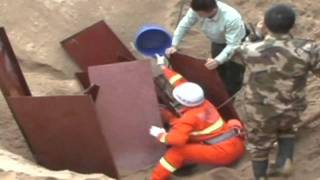 Man in China trapped in sandpit [upl. by Tound]