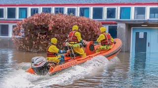 Heroic Rescue of Trapped Dog from Flooded School [upl. by Surovy]