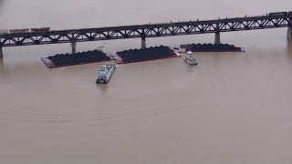 2 barges partially submerged after 10 break loose on Ohio River get stuck at bridge [upl. by Ettedo84]