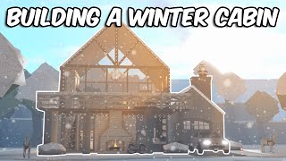 BUILDING A SNOWY WINTER CABIN IN BLOXBURG [upl. by Iman]