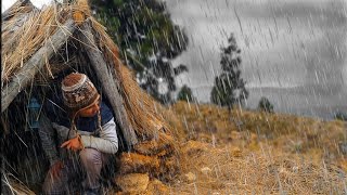 Surviving in extreme weather sun rain cold and a lot of wind Bushcraft Camping in the rain [upl. by Burley866]