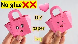 Origami paper bagDIY paper bagPaper bag without glueNo glue paper craftPaper Craft without glue [upl. by Nyrb]