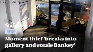 Moment thief breaks into London gallery and steals prized Banksy artwork [upl. by Ainiger]