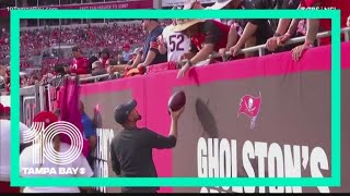 One Bucs fan was handed Tom Brady’s 600th touchdown ball and had to give it right back [upl. by Petulah]