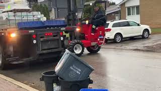 Moffett truck mounted forklift unloading bricks [upl. by Denison]