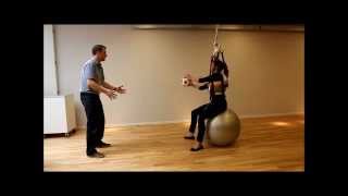 Guldmann Ceiling Hoist Rehab  Sitting Balance Exercise On Ball [upl. by Kilmarx]