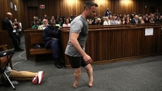 Oscar Pistorius Removes Prosthetic Legs in Court [upl. by Kralc524]