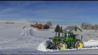 John Deere 8440 plowing snow in Bickleton WA DJI Phantom 3 standard drone and a go pro camera [upl. by Freyah380]