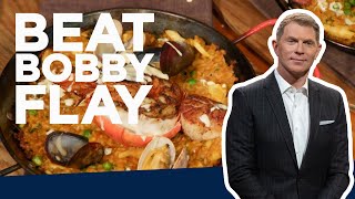 Bobby Flay Makes Seafood Paella  Beat Bobby Flay  Food Network [upl. by Yearwood]