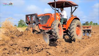 Kubota MU 5702 Pushing Dirt Tractor Kubota MU5702 push farmland [upl. by Oirtemed]