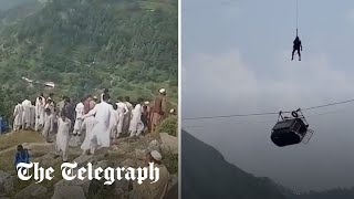 Children trapped in Pakistan gondola after cable snaps [upl. by Ateuqal]