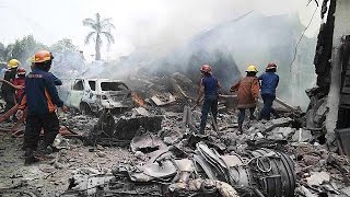 Dozens killed Indonesian military plane crashes on houses Sumatra [upl. by Ahtiek319]