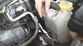 03 Ram 1500 4x4 Windshield Washer Fluid Tank Removal [upl. by Oca]