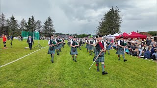 Drum Major leads Ballater Pipe Band playing Cabar Feidh on march during 2024 Dufftown Highland Games [upl. by Ayr]