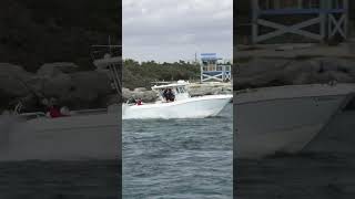 Leaping Behind the Wake Catamaran Shows Off at Haulover Inlet Following Luxury Yacht [upl. by Boucher]