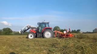 fenaison 2016 massey ferguson 6445 et faneuse Kuhn [upl. by Ahtelat629]