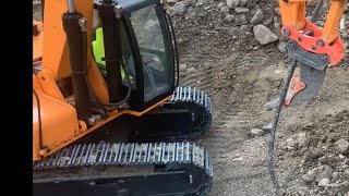 Rc excavator 4200xl with scarifier digging hard pack soil Rc construction equipment RC tractors [upl. by Noryv]