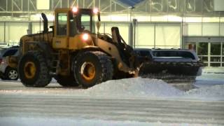 Volvo L110E Loader with Snow Plow Cleaning up a Parking Lot [upl. by Sirtimed]