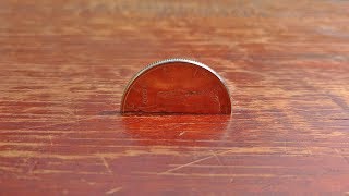 COIN THRU TABLE MAGIC TRICK REVEALED Learn Expert Level Magic [upl. by Acirret]