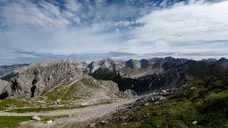 9123 Biking through Innsbruck Austria then walking around the Alps near town [upl. by Ellenahs350]