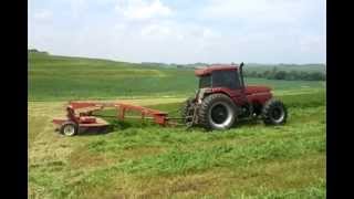 Case IH Magnum 7120 tractor and Case IH 8312 disc windrower [upl. by Hartnett88]