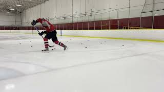 Stick handling around pucks for warmup round 2 [upl. by Shippee823]