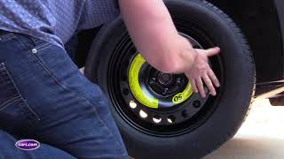 How to Change a Tire A StepbyStep Guide— Carscom [upl. by Raven]