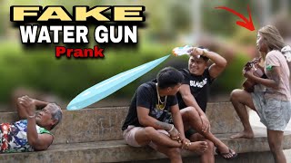 FAKE WATER GUN quotPUBLIC PRANKquot  with wonderful voice [upl. by Hosea]