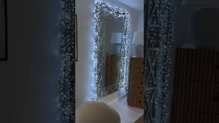 Twinkling lights on the mirror add a festive touch 💖🏠 ollnyclusterlights christmasdecor [upl. by Valenba153]