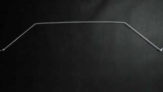 Slow motion rubber string pulled and released [upl. by Parrie]