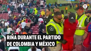 Violentas peleas entre hinchas en el partido de Colombia contra México  El Espectador [upl. by Aleuqahs929]