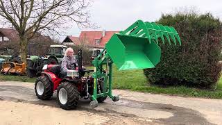 Hecklader  Theilmann Landtechnik GmbH  Carraro mit Heckloader Krokodilgebiss Heckstapler Schaufel [upl. by Wershba]