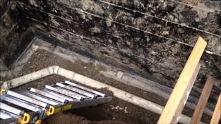 House foundation repair Part 3  Drain tile and waterproofing [upl. by Akirdnas]