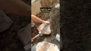 Cutting sandstone with 575 stonemason hammer stonewalling gardendesign canberra stonemasonry [upl. by Yznyl477]